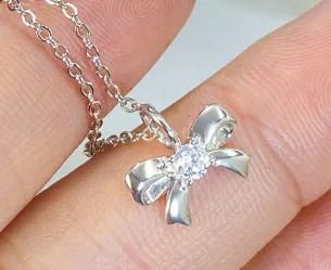Silver Bow Necklace - Elegant Sterling Silver Bow Pendant Jewelry for Women